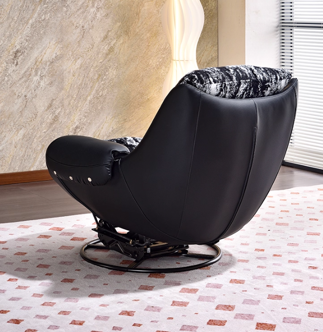 A Modern 360° Rotatable Ergonomic Accent Chair With a Black Faux Leather Base And a White And Black Floral Fabric Cushion