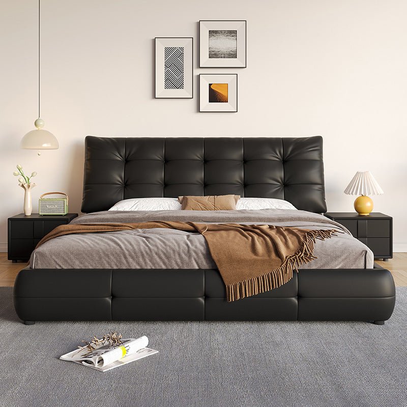 Black Faux Leather Upholstered Queen Size Platform Bed With A Tufted Headboard