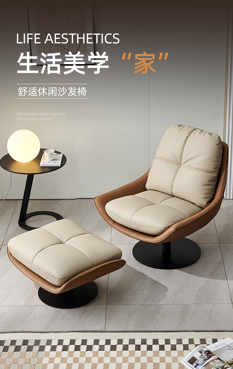 Modern swivel lounge chair with a high-back and removable cushions, upholstered in off-white faux leather with a black metal base