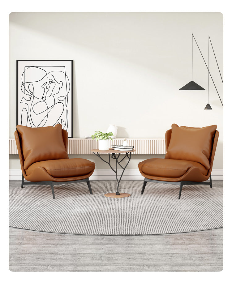 Mid-century Modern Side Chair With a Tan Faux Leather Or Fabric Upholstery and a Black Frame.