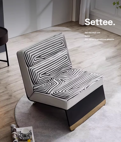 Brillen Labyrinth Lounge Chair Featuring a Black and White Maze Pattern on Leather Upholstery