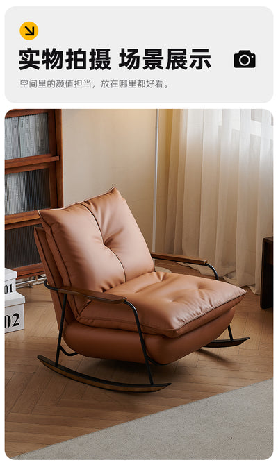 Elegant Casual Lazy Home Rocking Chair In a Tan Faux Leather Finish With a Black Metal Frame