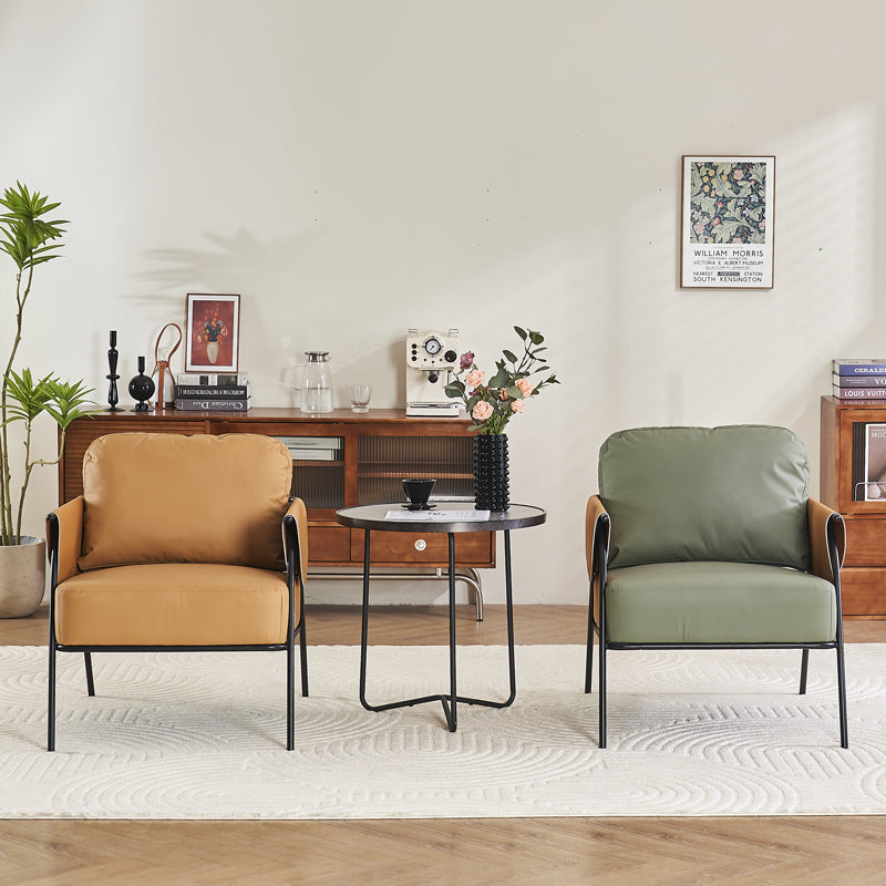 Lounge Chair With A Black Metal Frame, Light Grey Fabric Cushions, And Dark Brown Leather Armrests