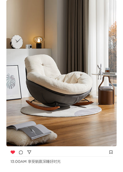 Modern Upholstered Rocking Chair With a Brown Leather Base and White Fabric Cushion