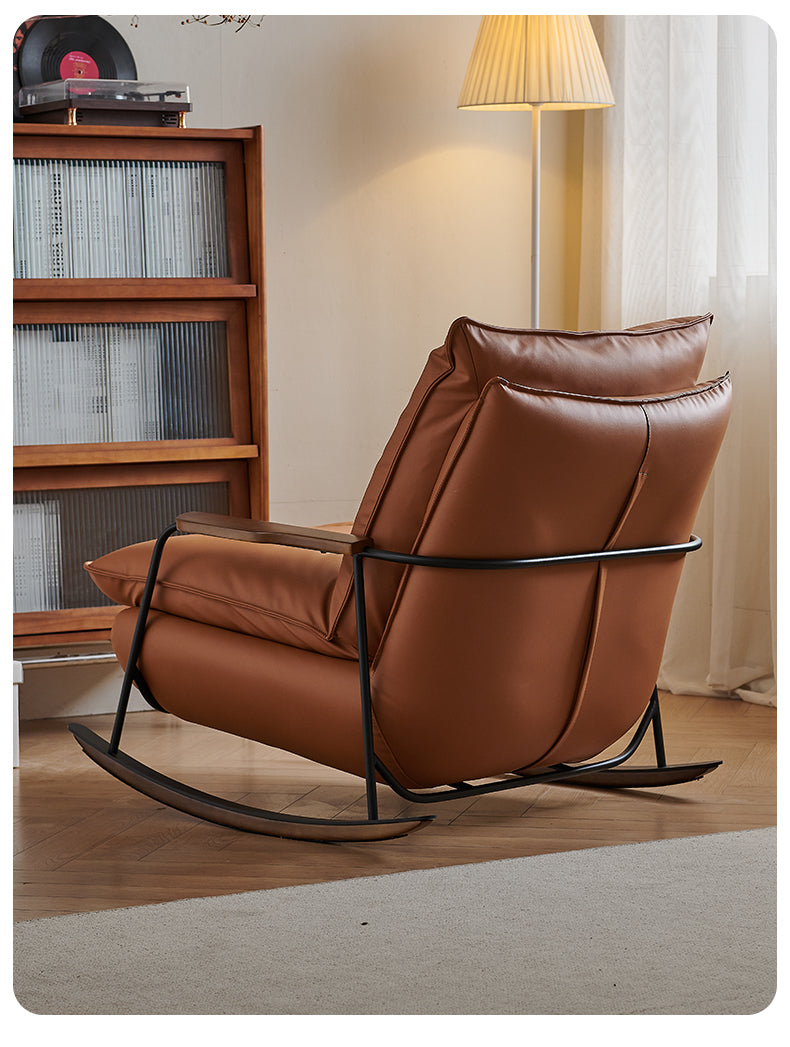 Elegant Casual Lazy Home Rocking Chair In a Tan Faux Leather Finish With a Black Metal Frame