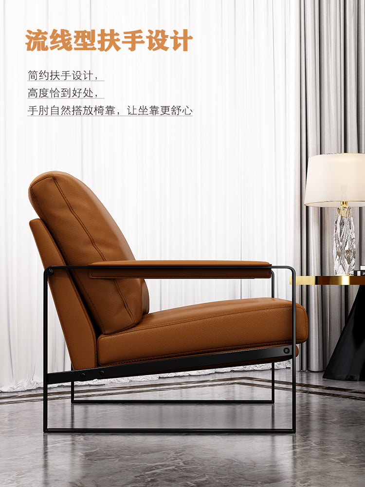 Mid-century Modern Accent Chair Featuring Brown Faux or Genuine Leather Upholstery and a Black Metal Frame