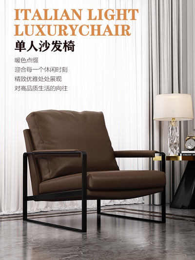 Mid-century Modern Accent Chair Featuring Brown Faux or Genuine Leather Upholstery and a Black Metal Frame