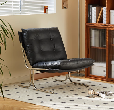Mid-century Modern Black Faux Leather Lounge Chair With a Chrome Frame